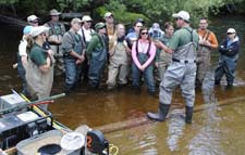 Teachers learn about the use of electro-fishing for fish management and research.