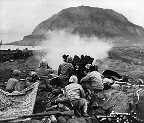 37mm Gun fires against cave positions at Iwo Jima.jpg