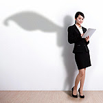 recruiter with tablet casting shadow with superhero cape