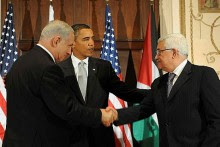 Netanyahu shakes hands with Abbas in 2009 in a meeting arranged by Obama, for whom they share mutual suspicion.