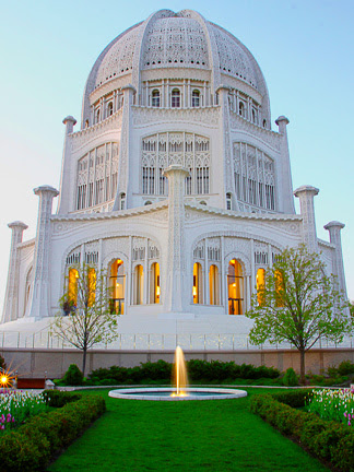 Gardens and fountain in front of the House of Worship as the sun goes down