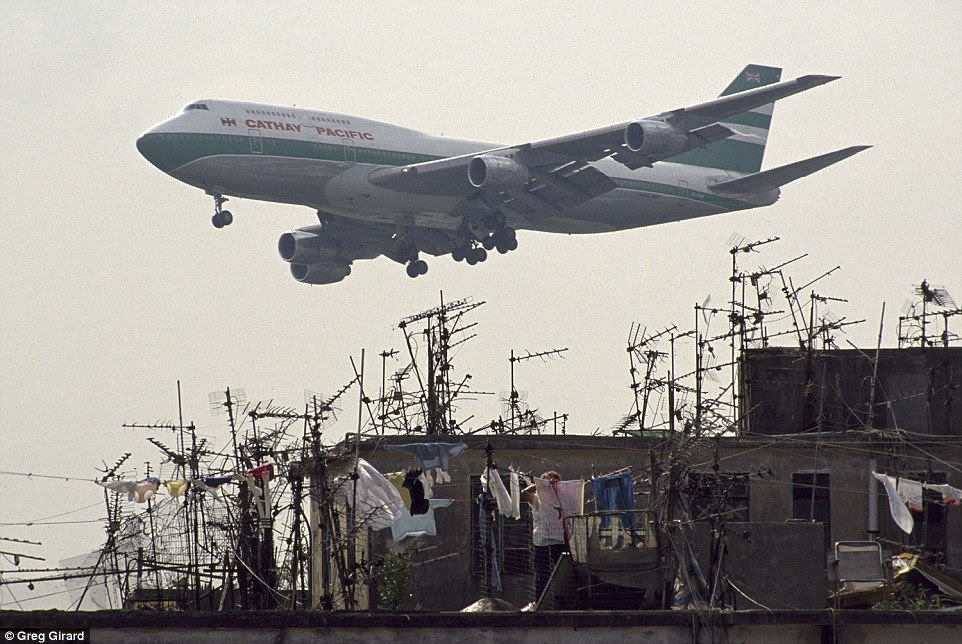 Airline passengers had a stunning view of the walled city when the flew into Hong Kong's Kai Tak Airport, which closed in 1998