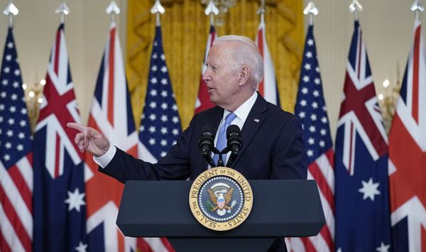 President Joe Biden, joined virtually by Australian Prime Minister Scott Morrison and British Prime Minister Boris Johnson, speaks about a national security initiative in the East Room of the White House in Washington, Wednesday, Sept. 15, 2021. (AP Photo/Andrew Harnik)