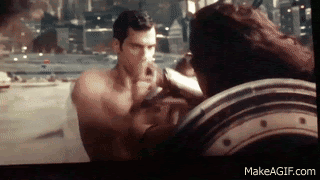 Superman headbutting Wonder Woman and her headbutting him back GIF