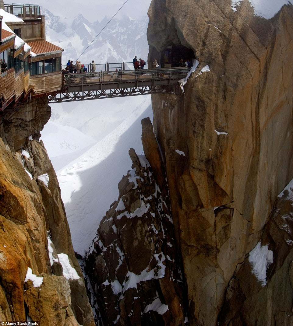 This                                                      viewing platform                                                      at the Aiguille Du                                                      Midi mountain in                                                      Chamonix-Mont-Blanc                                                      more than earns                                                      its place on the                                                      list with its                                                      terrifying 9,200ft                                                      drop