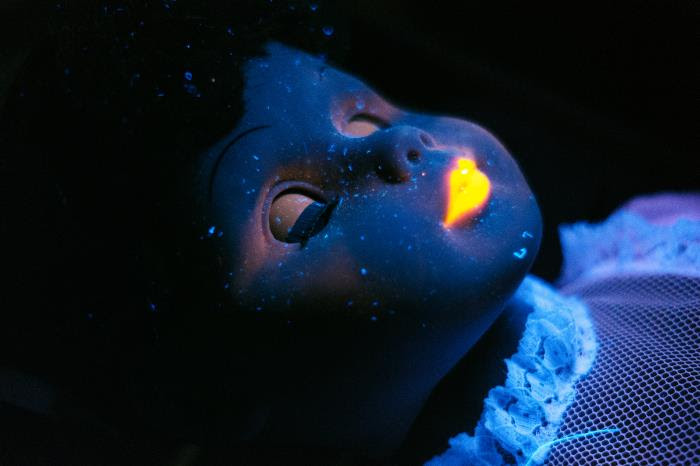 Baby doll under UV light