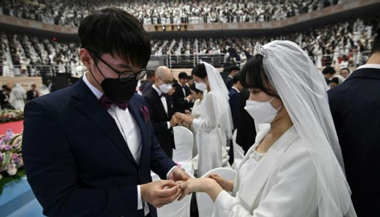 زواج جماعي بالكمامات في كوريا الجنوبية 