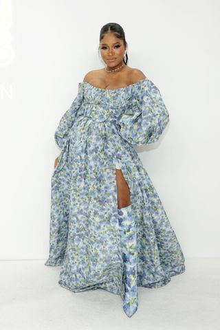 Image may contain Dress Clothing Fashion Person Adult Jewelry Necklace Accessories Formal Wear and Gown