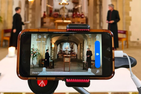 Phone filming a service for people to watch online